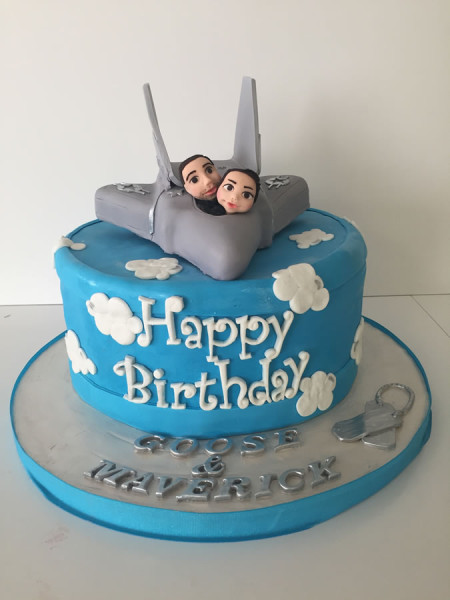 Top Gun theme birthday cake with airplane