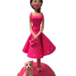 Lady in Pink with dog cake topper