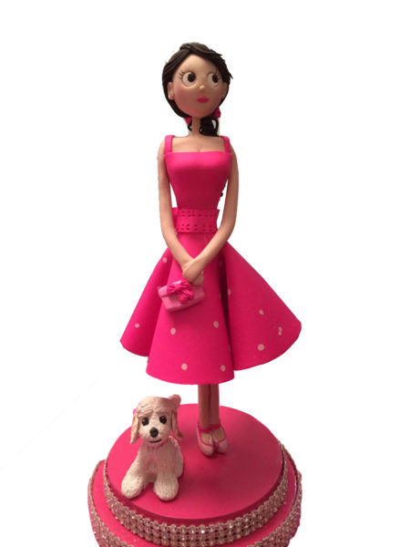 Lady in Pink with dog cake topper